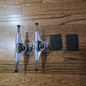 Skateboard Trucks - Silver. Lightweight.  Sold in pairs.